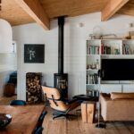 The family transformed a 70s-era rancher and an adjacent outbuilding into a restrained, pared-back home and studio that feel a bit like camping.