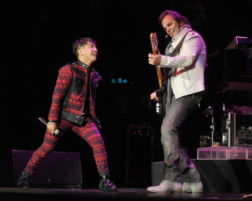 Wine lover Jonathan Cain (left) rocks out with Journey lead singer Arnel Pineda in San Francisco (Photo: Kelly A. Swift)