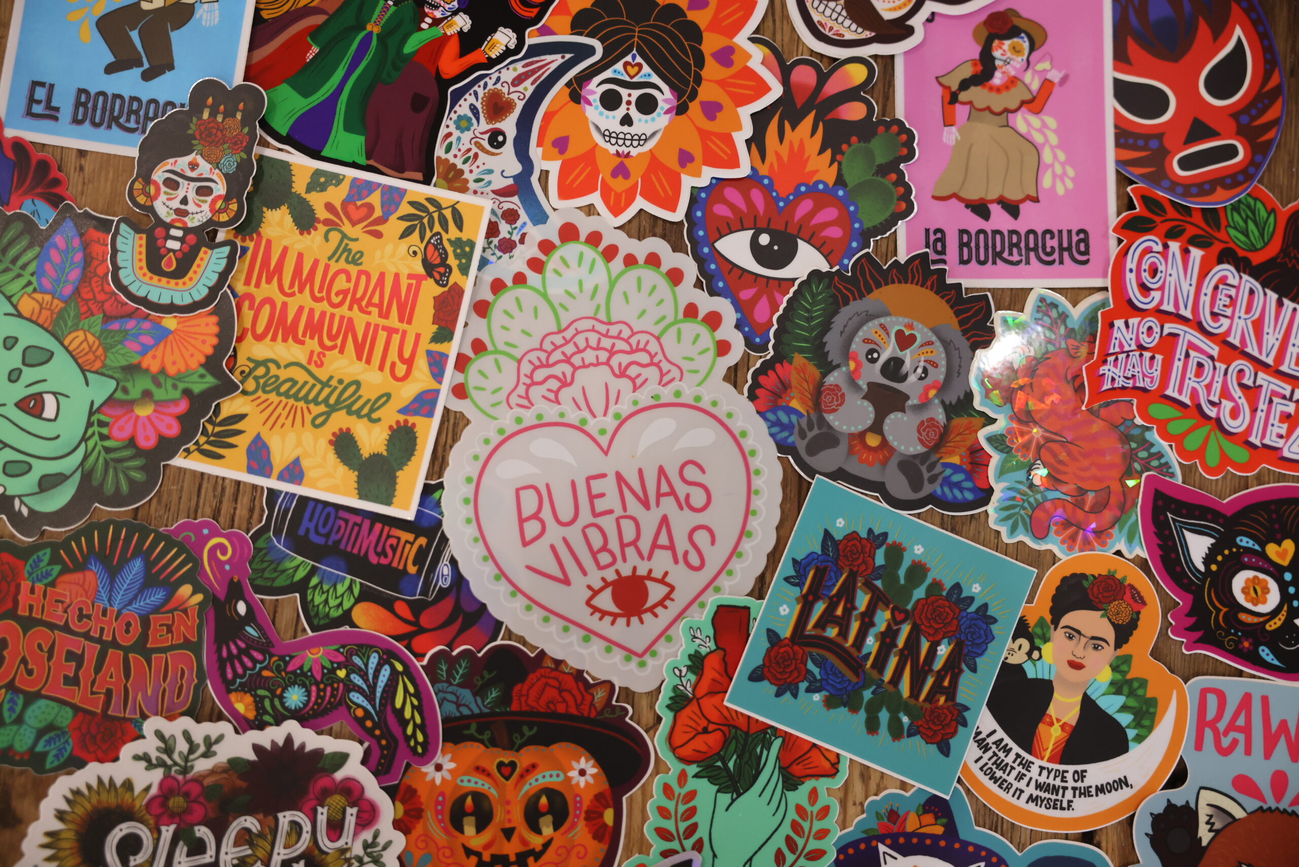 A collection of stickers featuring Blanca Molina’s art. They are a popular and portable way for people to display her work on cars, water bottles and laptops. (Beth Schlanker / The Press Democrat)
