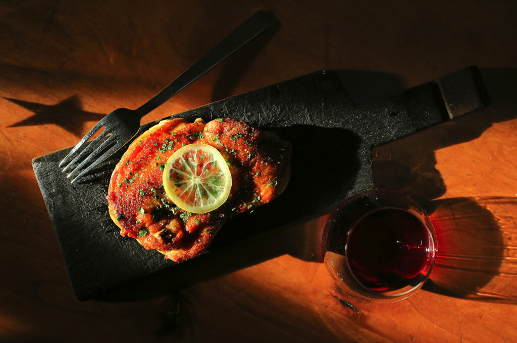 Brick chicken with parsley and lemon from the Glen Ellen Star restaurant. (John Burgess / The Press Democrat)