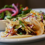 Once you’ve fallen off the wagon of ridiculous New Year’s promises to lose weight and work out daily, reward yourself at these delish eateries. 