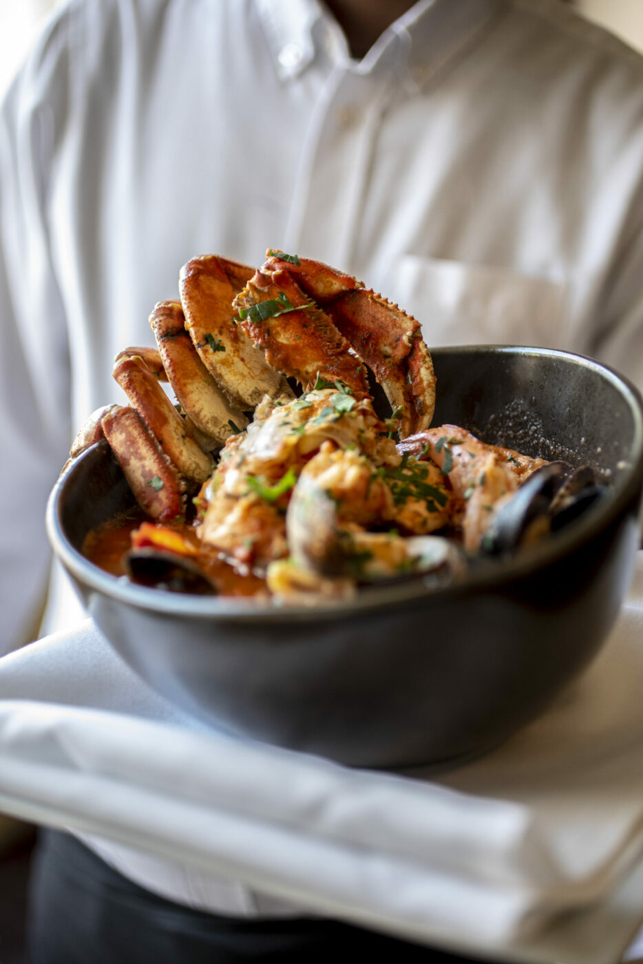 Dungenesse Crab Cioppino with mussels, clams, calamari, prawns, and salmon on a marinara lobster sauce at Sonoma Grille in Sonoma on Friday February 4, 2022. (Chad Surmick / The Press Democrat)