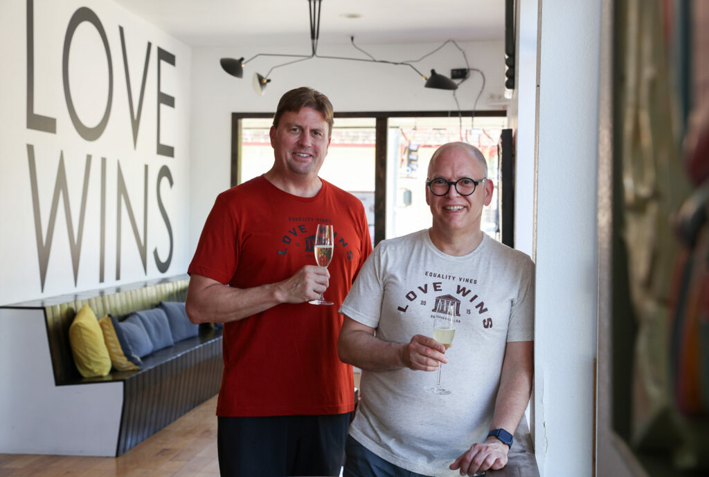 Equality Vines co-founders Matt Grove, left, and Jim Obergefell at their tasting room in Guerneville, Thursday, July 13, 2023. (Christopher Chung / The Press Democrat)