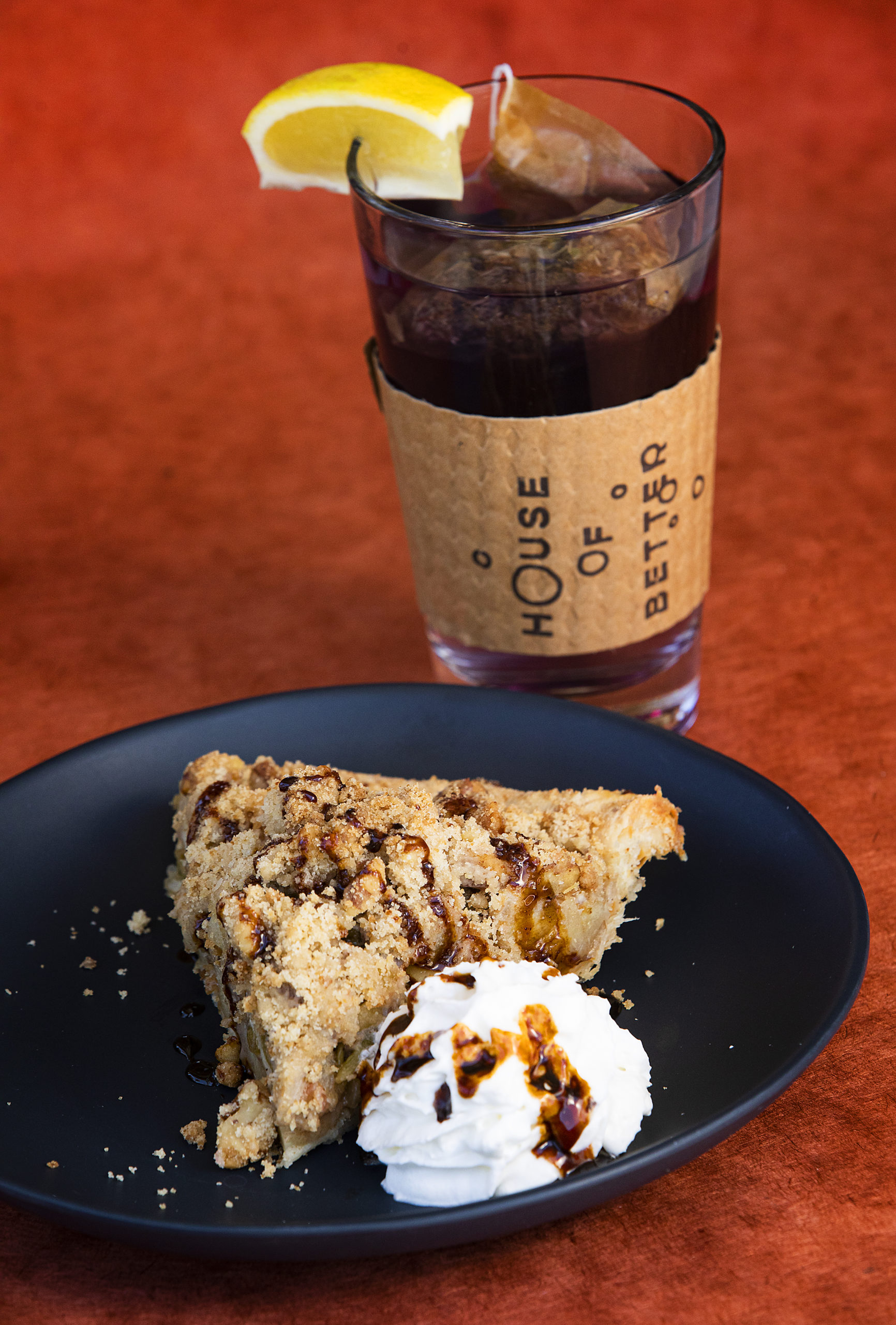 House specialty Green Chile Apple Pie with walnut streusel, cheddar crust, whipped cream and a red chile honey drizzle and an Adaptogenic mushroom tea from the House of Better at the newly renovated Dr. Wilkinsons Backyard Resort and Mineral Springs in Calistoga on Tuesday, July 6, 2021. (Photo by John Burgess/The Press Democrat)
