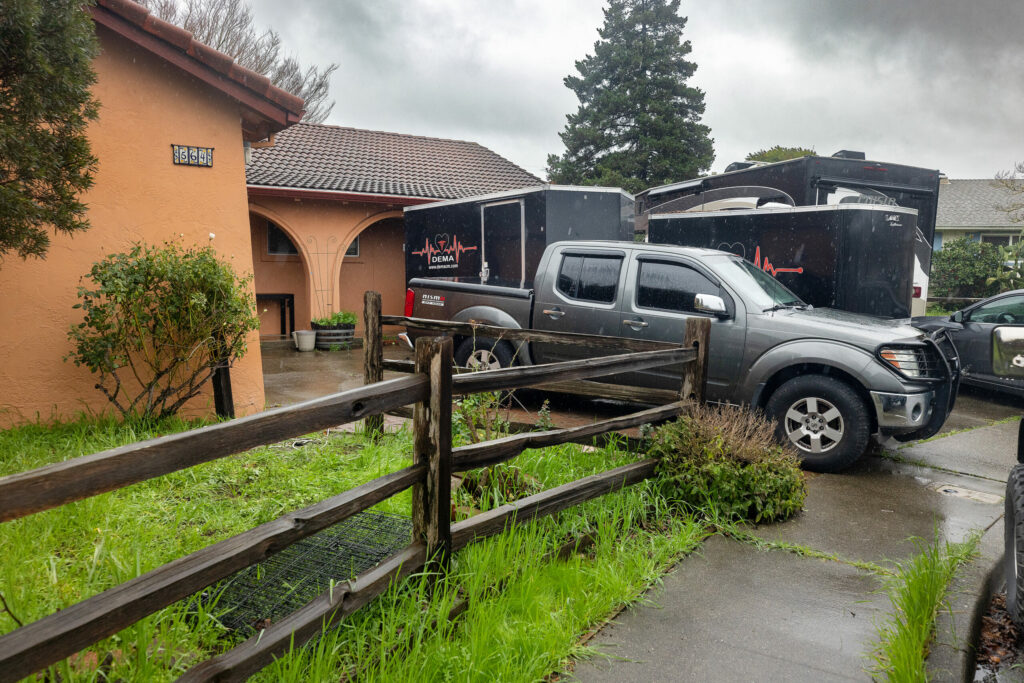 The home of DEMA CEO Michelle Patino with two DEMA vans parked in the driveway Thursday, February 13, 2025. (John Burgess / The Press Democrat)