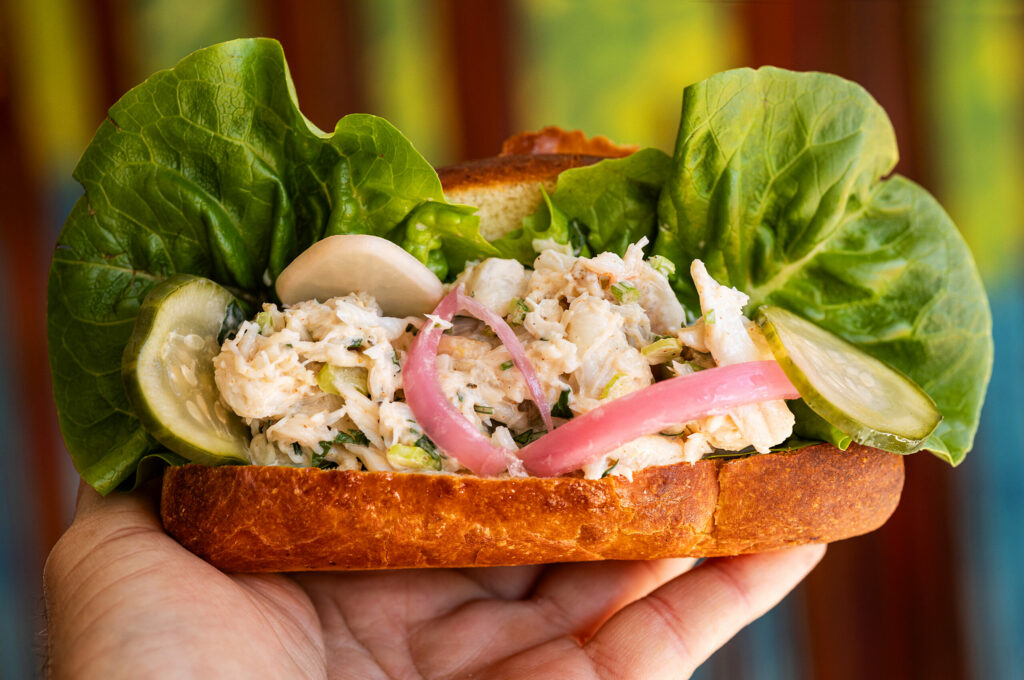 New England Style Crab Roll with Dungeness crab salad, gem lettuce, house pickles on house baked brioche bun from Trillium Winebar & Taproom Friday, February 28, 2025, on Main Street in Guerneville. (John Burgess / The Press Democrat)
