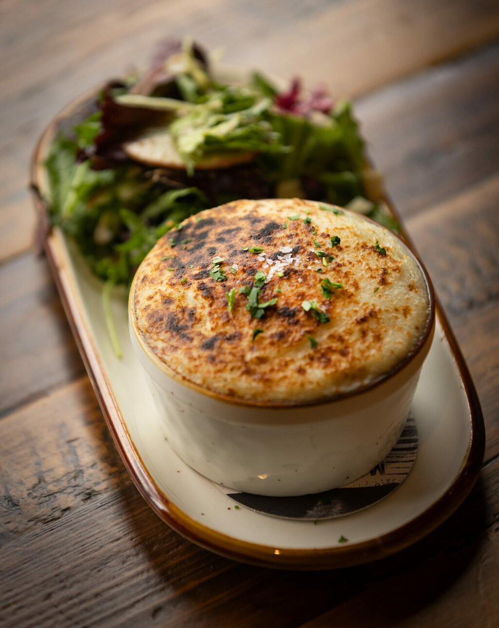 Guinness Braised Beef Pie with mushrooms and toasted carrots and a side of greens from The Goose & Fern, Wednesday, March 6, 2024, in Santa Rosa. (John Burgess / The Press Democrat)
