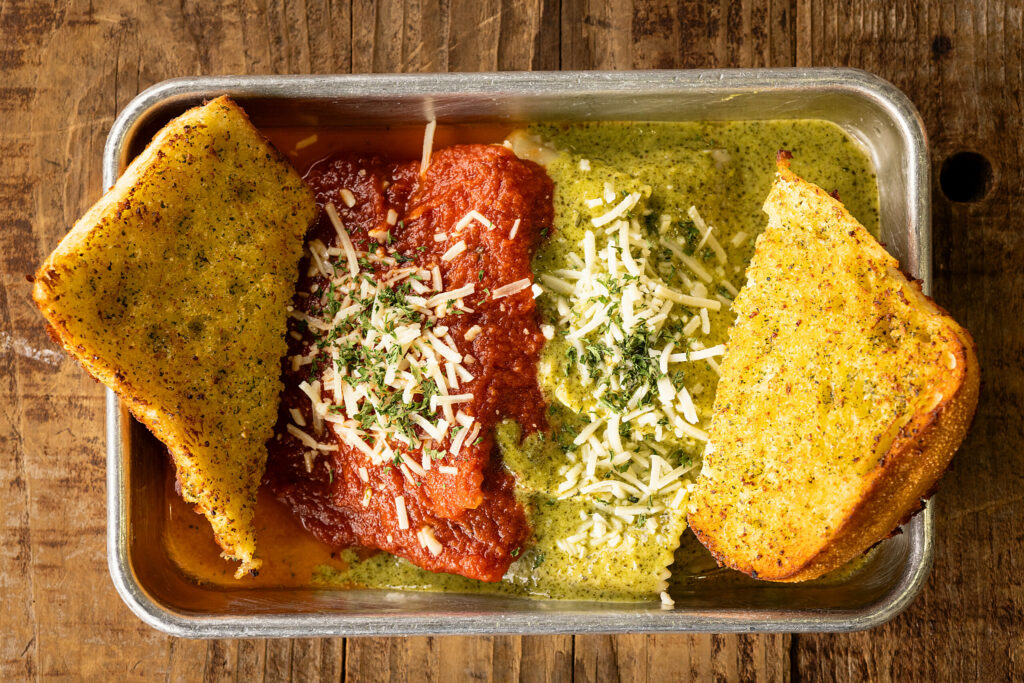 Housemade ravioli with marinara and pesto from Canevari’s Deli Friday, March 14, 2025, hidden in the Santa Rosa’s JC neighborhood. (John Burgess / The Press Democrat)