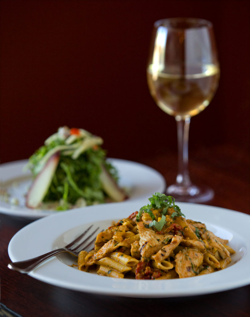 The lunch special includes penne with chicken and an arugula salad and a scoop of gelato from Alfredo's Italian Restaurant in Petaluma. (John Burgess/The Press Democrat)