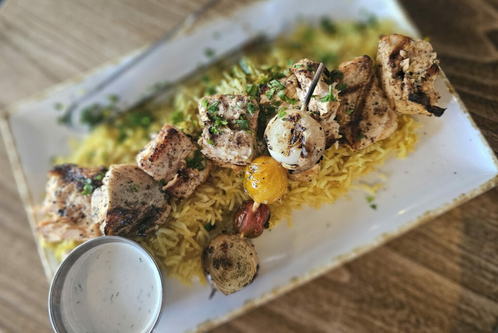 Salmon skewers with saffron rice at Levant restaurant in Petaluma. (Heather Irwin/The Press Democrat)