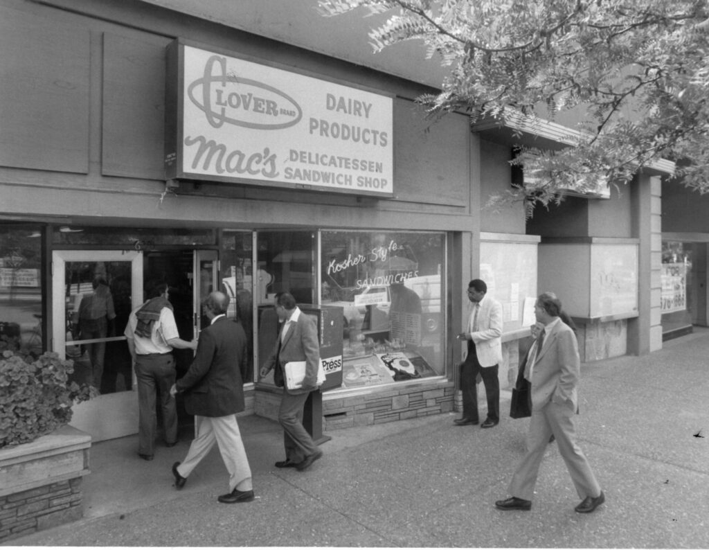 People walk into Mac's Deli in Santa Rosa on April 23, 1987. Mac Nesmon opened the deli in 1952. (Timothy Baker / The Press Democrat file)