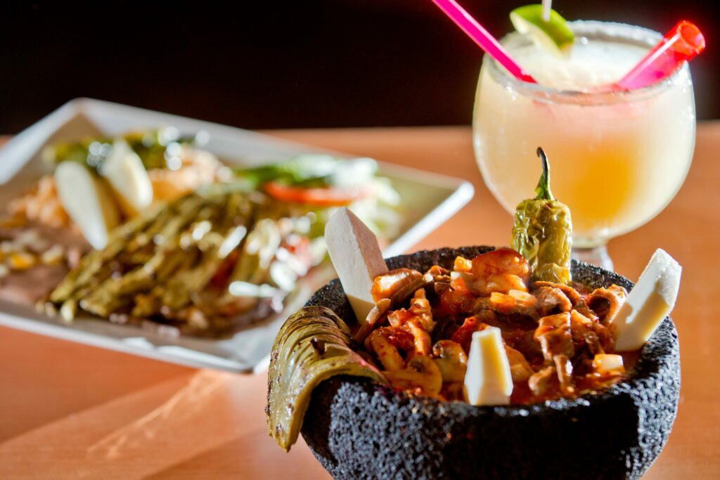 A molcajete and margarita from Taqueria Molcajetes, a Mexican taqueria in Santa Rosa that was featured on Guy Fieri's Food Network series "Diners, Drive-ins and Dives" for its smoking-hot Molcajete Mixto. (Alvin Jornada / The Press Democrat, file)