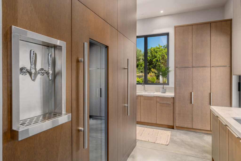 Kitchen cabinets and walk-in refrigerator. (CS Photography / Sotheby’s International Realty)