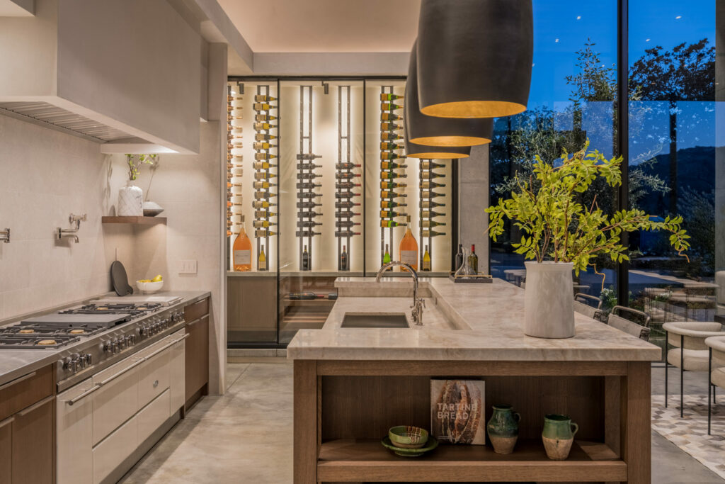 Kitchen and wine cellar in Kenwood home