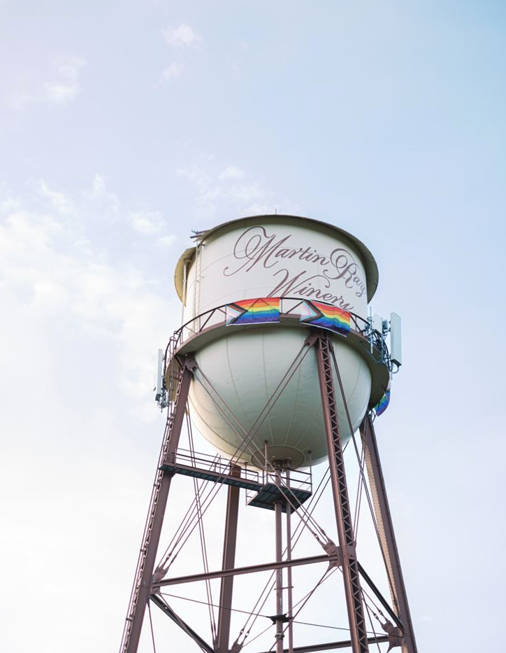 Every June for the past 16 years, a rainbow flag has flown from the tall water tower at Martin Ray Vineyards & Winery in northwest Santa Rosa. The winery celebrates Pride Month with a series of Pride & Pizza events. (Martin Ray Vineyards & Winery)
